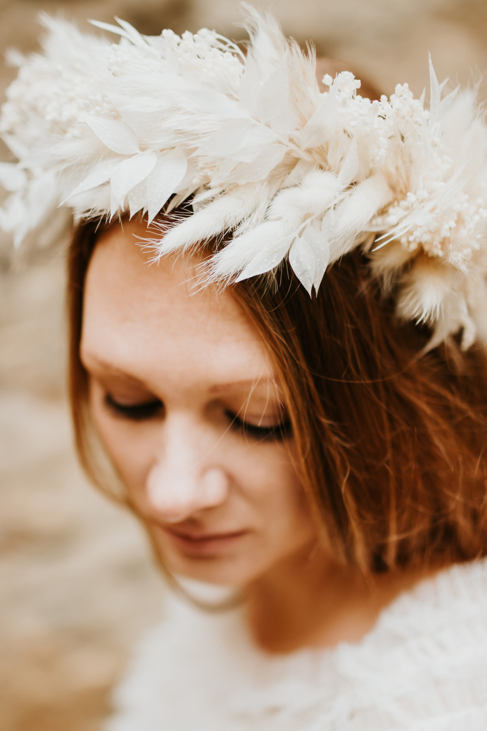 Close up of dried flower hair crown on bride for wedding