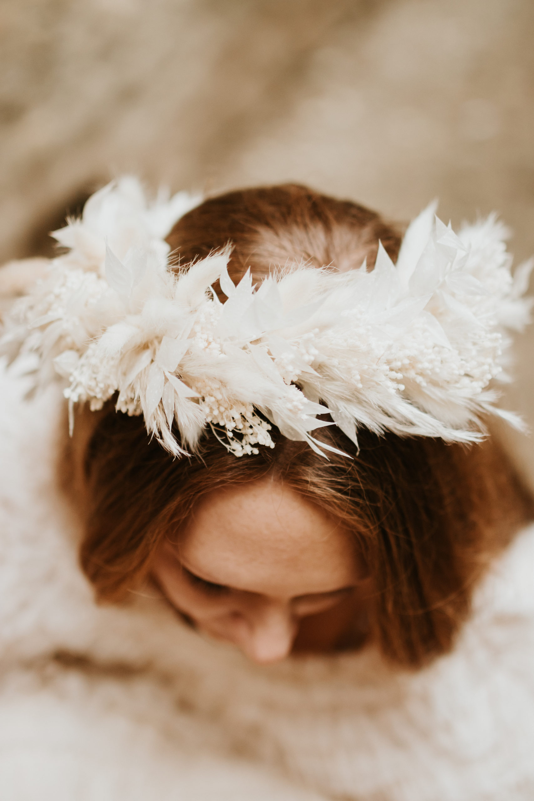 Ginger bride wearing a dried flower crown