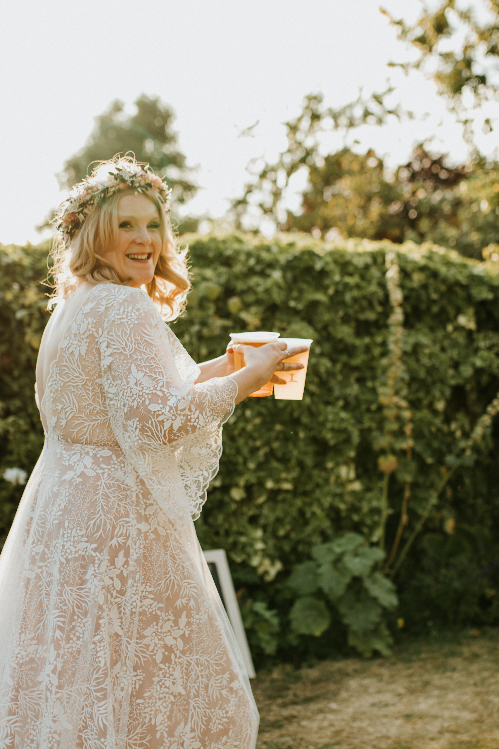Bride wearing lace gown and floral crown | Wedding Photographer in Buckinghamshire