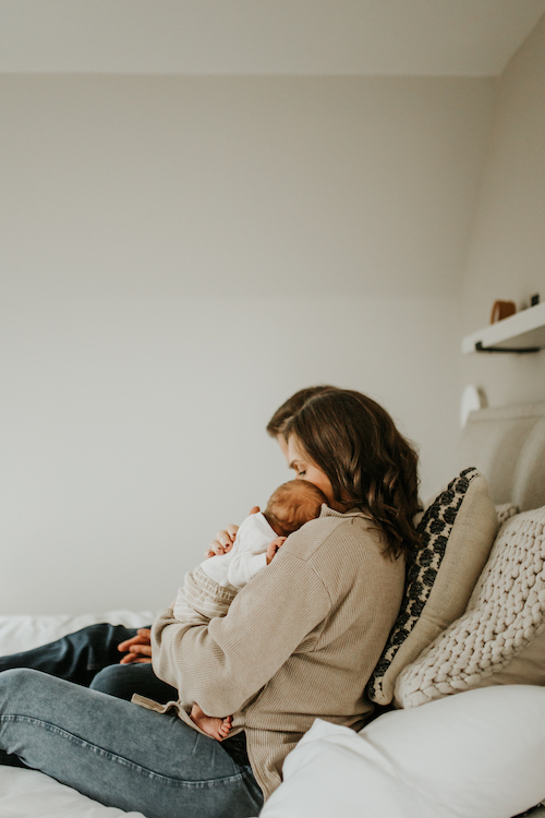 Mum Cuddling Newborn Baby | Newborn And Family Portfolio