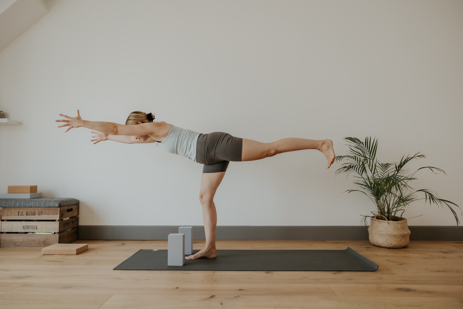 Yoga teacher holding yoga pose. Branding photoshoot.