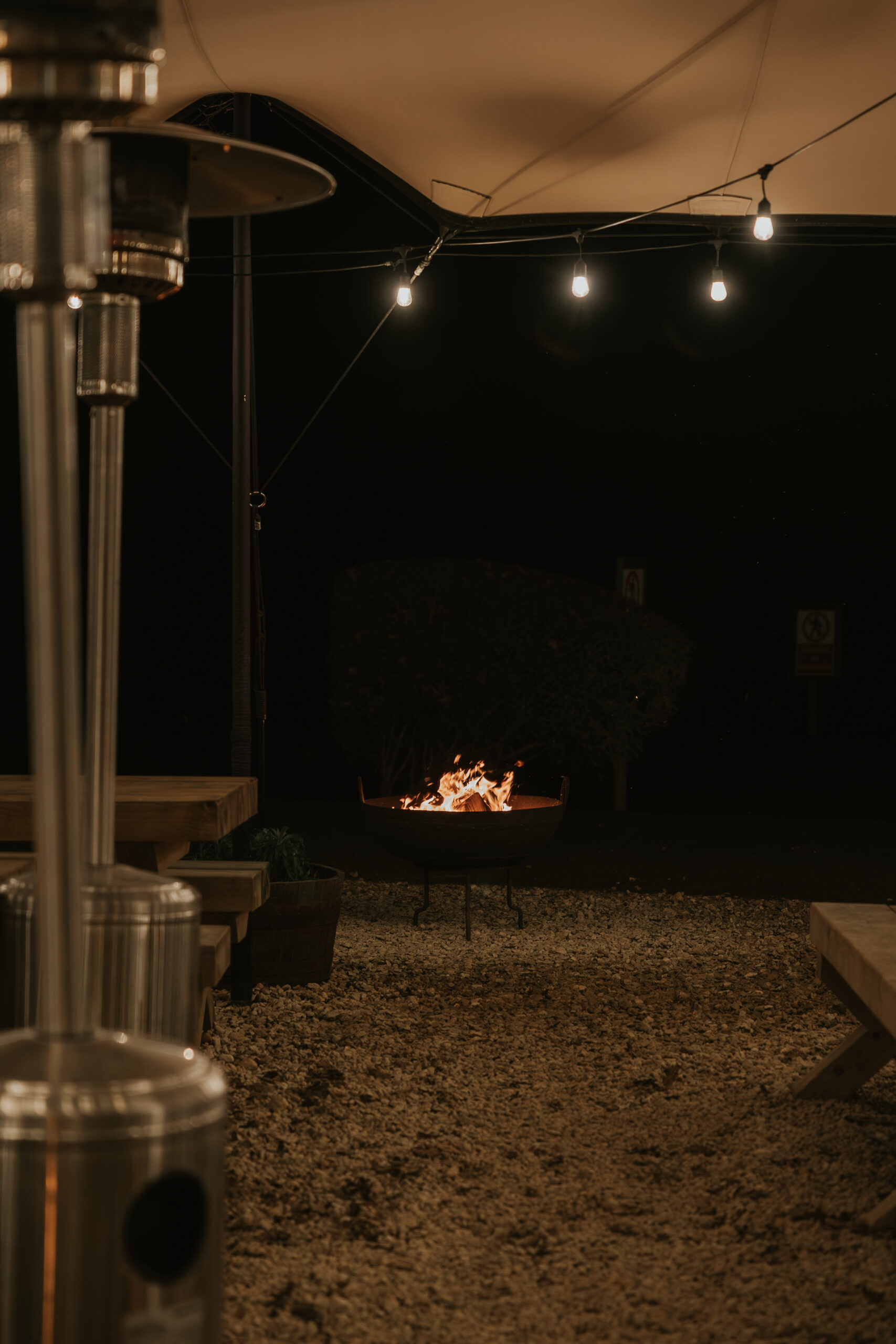 Private event at Todenham Manor Farm. Image of the firepit at night.